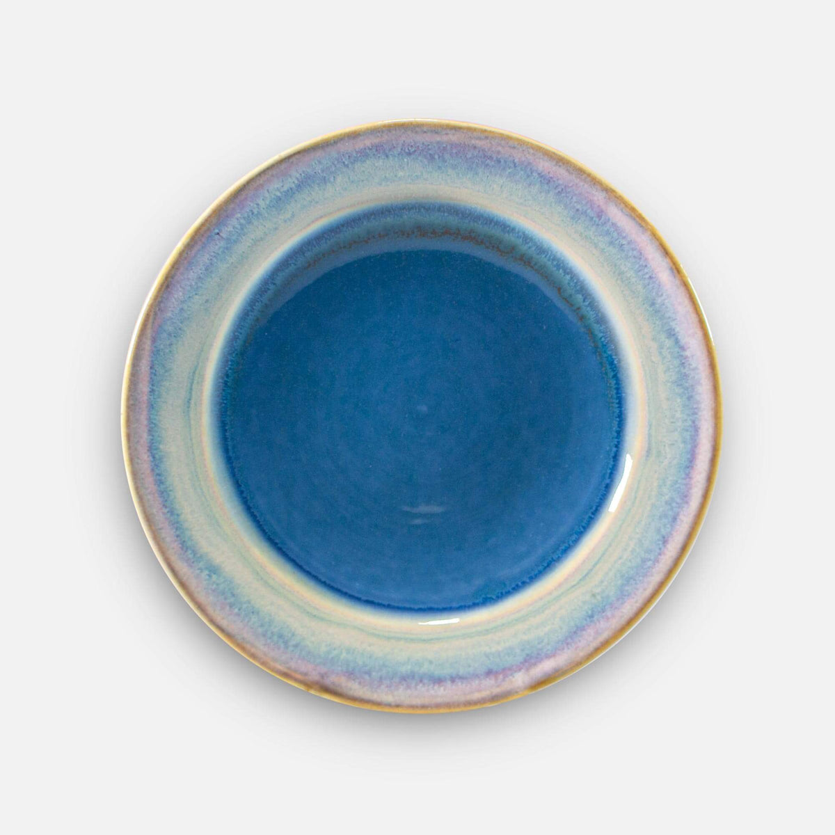 Handmade Pottery Footed Dinner Plate in Blue Oribe pattern made by Georgetown Pottery in Maine