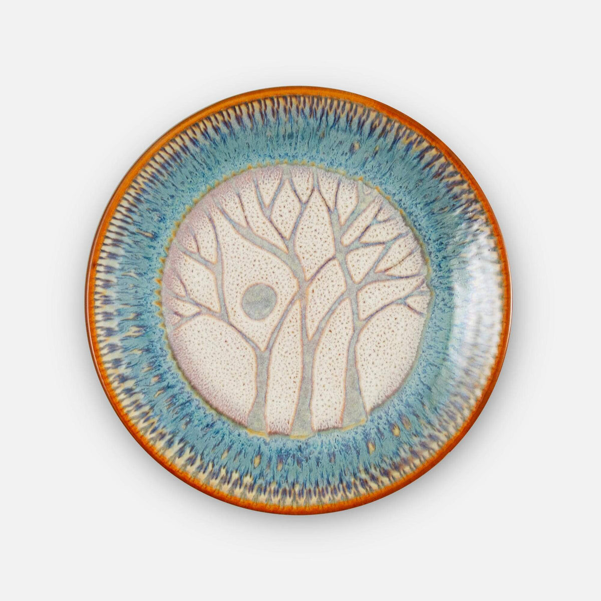 Handmade Pottery Rimless Dessert Plate made by Georgetown Pottery in Maine in Purple Tree pattern
