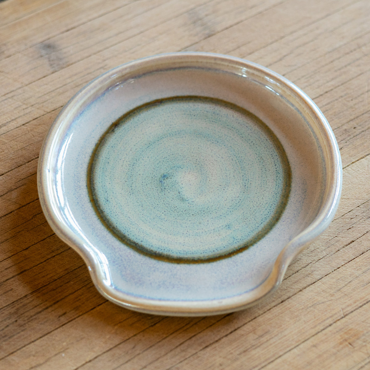 Handmade ceramic Spoon Rest in Ivory Green made by Georgetown Pottery in Maine